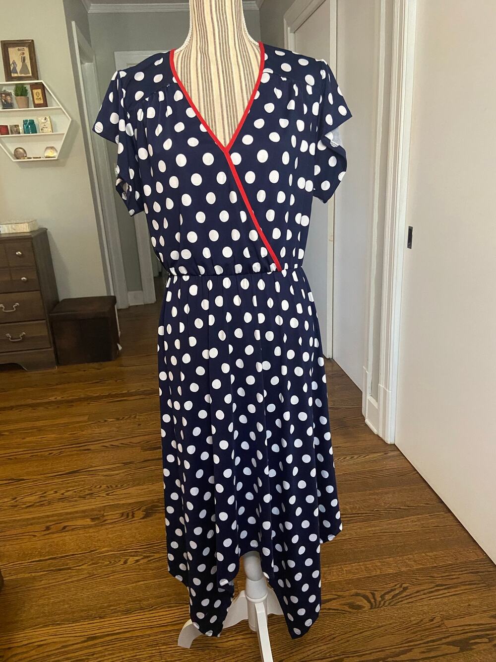 Navy/white polka dot drapey knit midi dress w/ red trim & asymmetrical hemline